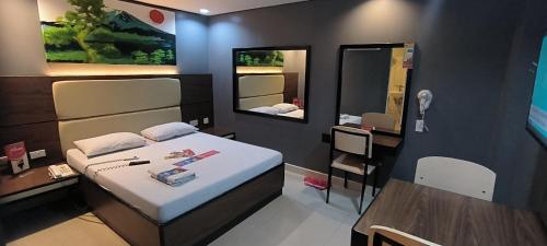 Imagen de la habitación del Hotel Sogo Davao. Foto 5
