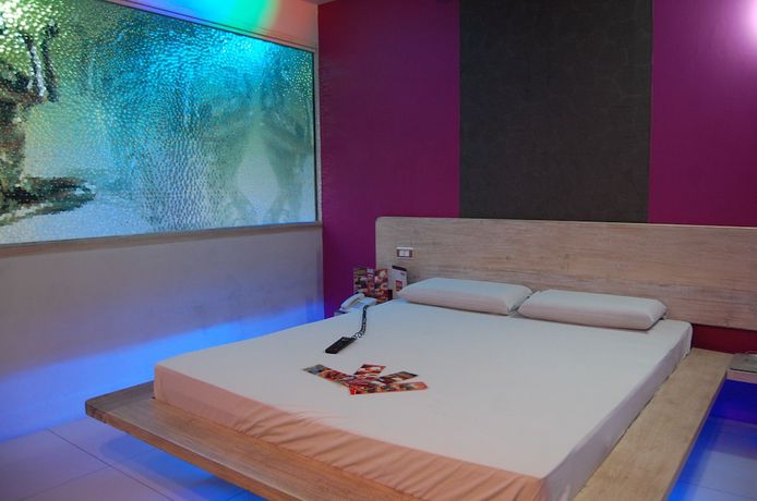 Imagen de la habitación del Hotel Sogo Tarlac. Foto 2