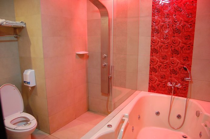 Imagen de la habitación del Hotel Sogo Tarlac. Foto 3
