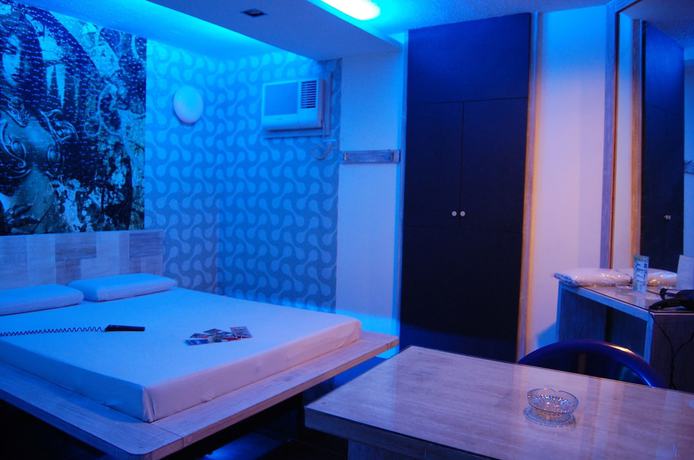 Imagen de la habitación del Hotel Sogo Tarlac. Foto 7