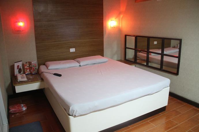 Imagen de la habitación del Hotel Sogo Tarlac. Foto 8