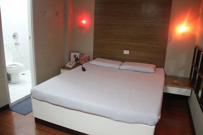 Imagen de la habitación del Hotel Sogo Tarlac. Foto 12