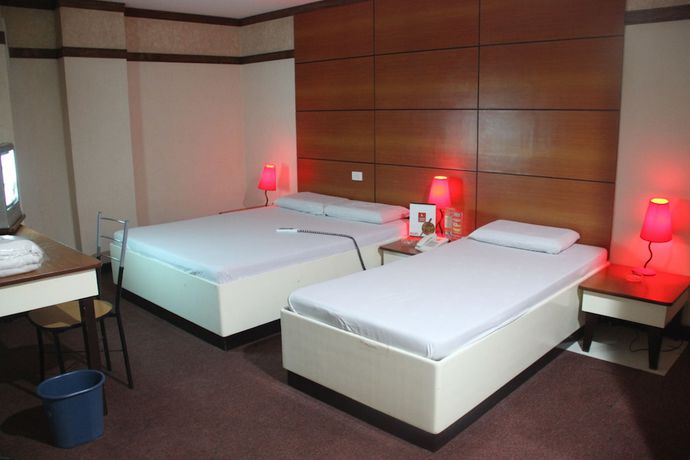 Imagen de la habitación del Hotel Sogo Tarlac. Foto 15