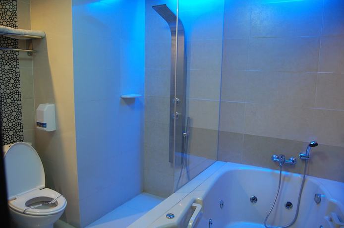Imagen de la habitación del Hotel Sogo Tarlac. Foto 16
