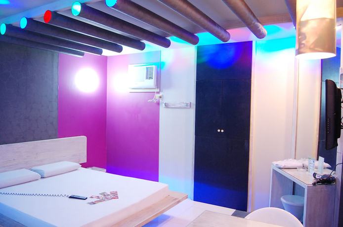 Imagen de la habitación del Hotel Sogo Tarlac. Foto 19