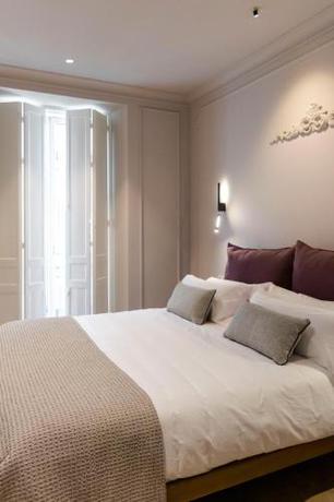 Imagen de la habitación del Hotel Soho Boutique Palacio de Pombo. Foto 12