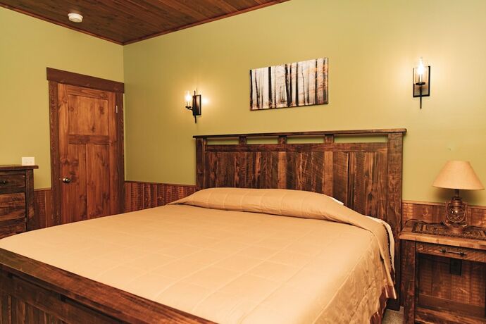 Imagen de la habitación del Hotel Sojourner\'s Lodge and Log Cabin Suites. Foto 12