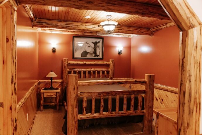 Imagen de la habitación del Hotel Sojourner\'s Lodge and Log Cabin Suites. Foto 13