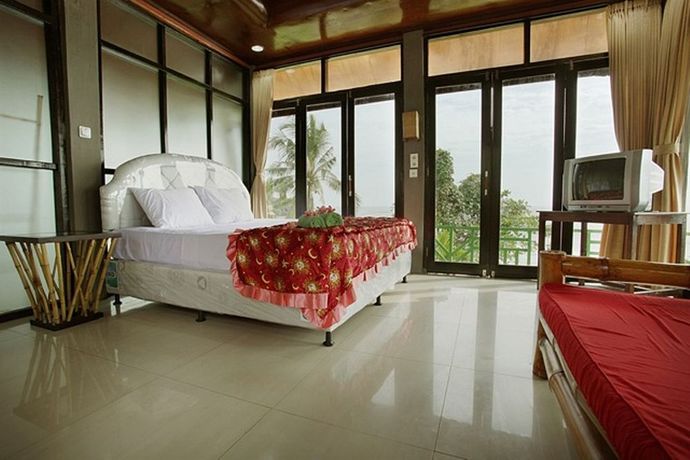 Imagen de la habitación del Hotel Soka Indah Restaurant and Bungalows. Foto 4