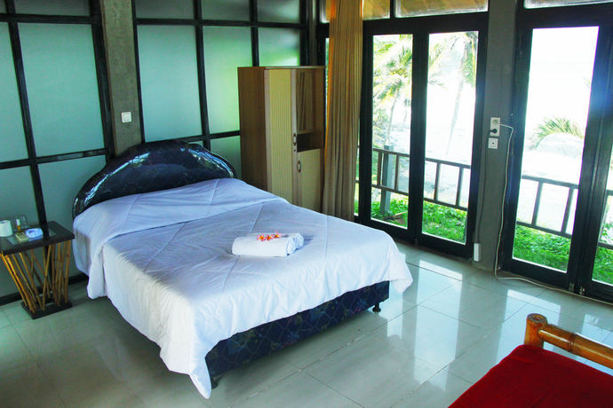 Imagen de la habitación del Hotel Soka Indah Restaurant and Bungalows. Foto 11