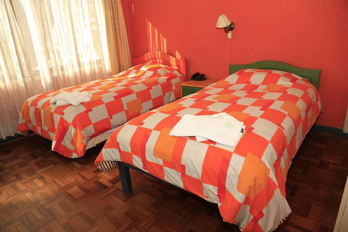 Imagen de la habitación del Hotel Sol Andino Hostal. Foto 11