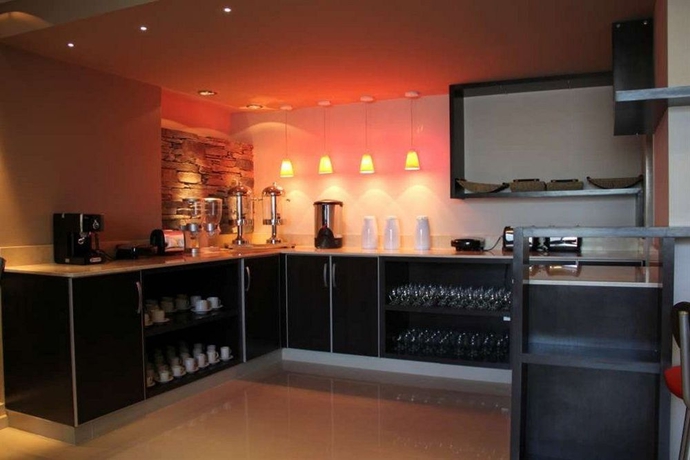 Imagen del bar/restaurante del Hotel Sol De Piedra Suites and Apart. Foto 4