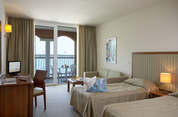 Imagen de la habitación del Hotel Sol Luna Bay Resort. Foto 7