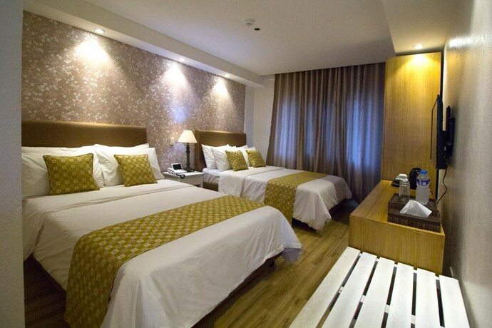 Imagen de la habitación del Hotel Sola Hotel. Foto 10
