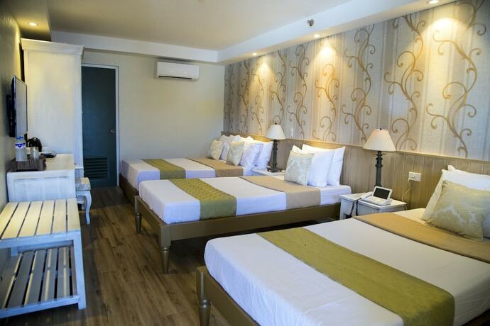Imagen de la habitación del Hotel Sola Hotel. Foto 15