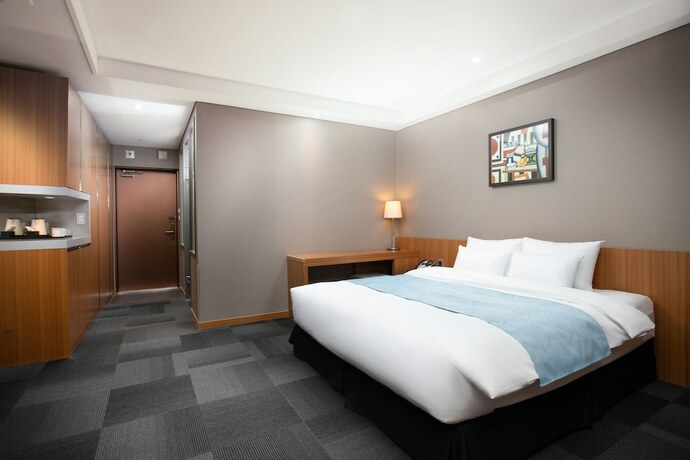 Imagen de la habitación del Hotel Solaire. Foto 16