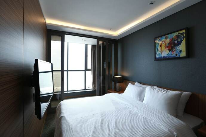 Imagen de la habitación del Hotel Solaire. Foto 26