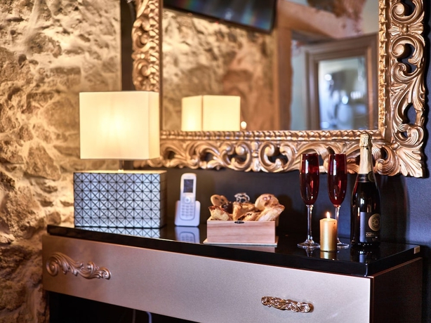Imagen de la habitación del Hotel Solar Antigo Luxury Coimbra. Foto 2