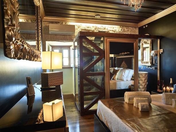 Imagen de la habitación del Hotel Solar Antigo Luxury Coimbra. Foto 7