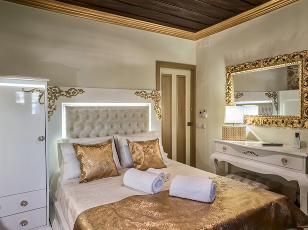 Imagen de la habitación del Hotel Solar Antigo Luxury Coimbra. Foto 13