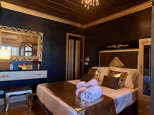 Imagen de la habitación del Hotel Solar Antigo Luxury Coimbra. Foto 16