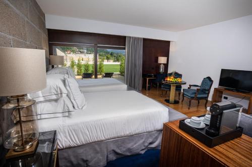 Imagen de la habitación del Hotel Solar Do Requeijo By Luna Hotelsandresorts. Foto 14