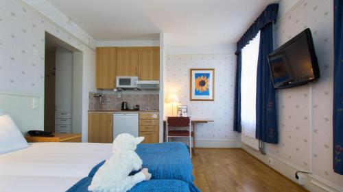 Imagen de la habitación del Hotel Solhem Basecamp Gotland. Foto 7