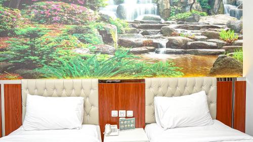 Imagen de la habitación del Hotel Solo Grand City. Foto 18