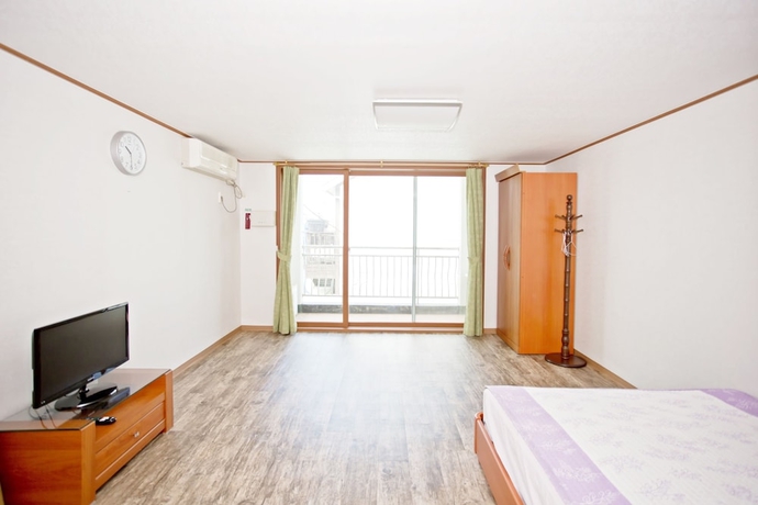 Imagen de la habitación del Hotel Solsum House. Foto 5