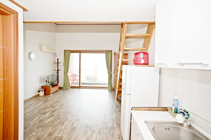 Imagen de la habitación del Hotel Solsum House. Foto 11