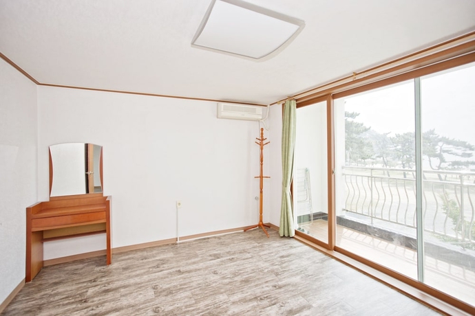 Imagen de la habitación del Hotel Solsum House. Foto 14