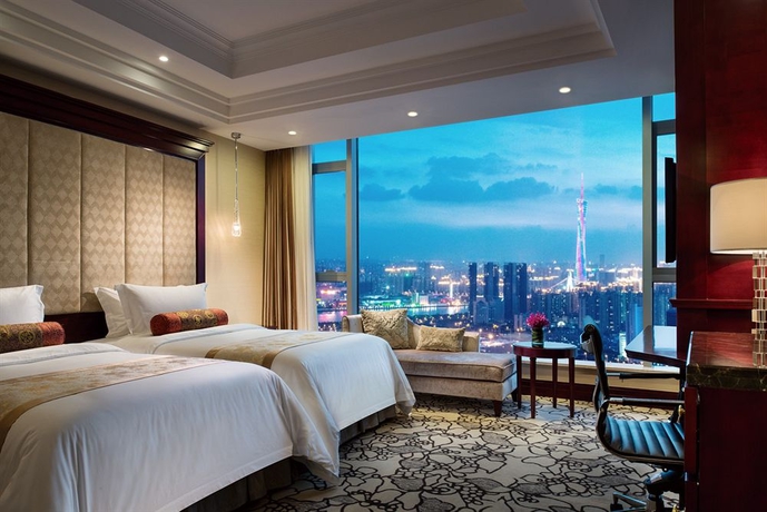 Imagen de la habitación del Hotel Soluxe Guangzhou. Foto 5