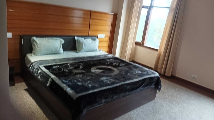 Imagen de la habitación del Hotel Som Kunj Circuit House. Foto 5
