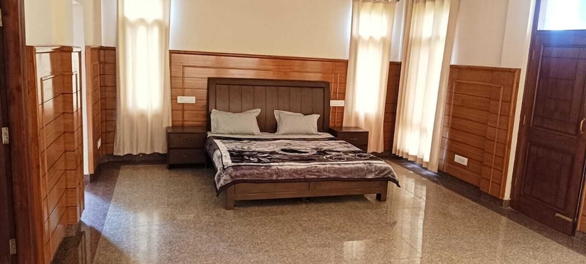 Imagen de la habitación del Hotel Som Kunj Circuit House. Foto 7