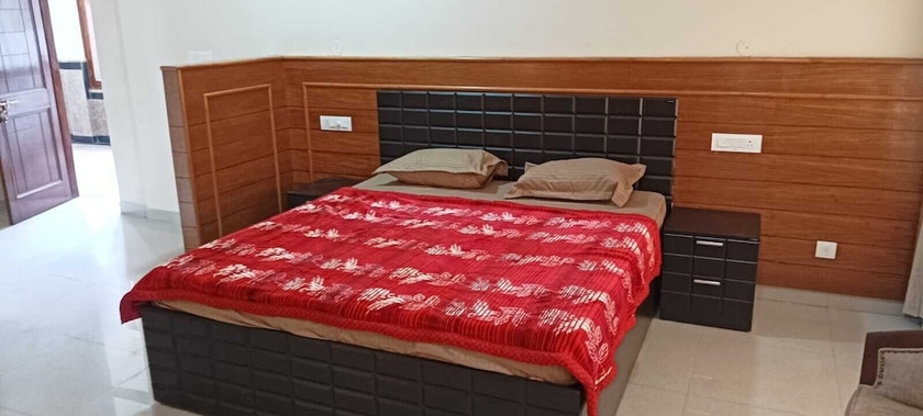 Imagen de la habitación del Hotel Som Kunj Circuit House. Foto 9