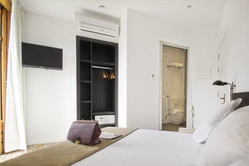 Imagen de la habitación del Hotel Som Nit Triomf. Foto 16