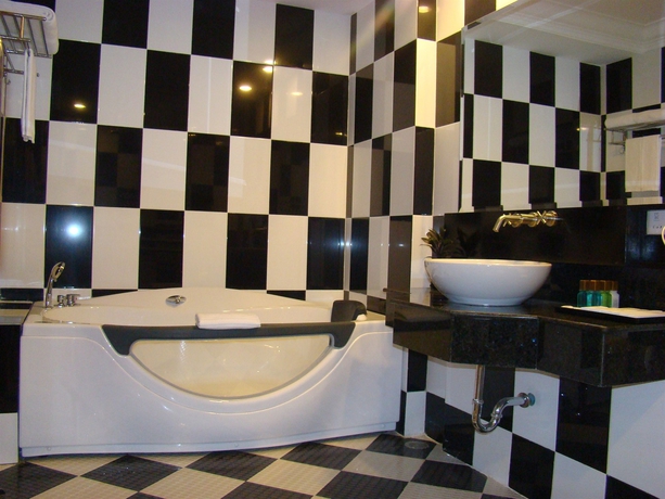 Imagen de la habitación del Hotel Somadevi Angkor Resort and Spa. Foto 13