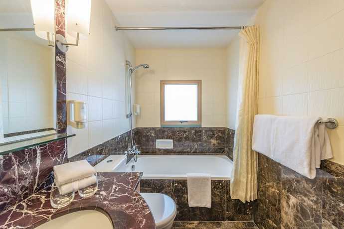 Imagen de la habitación del Hotel Somerset Bencoolen Singapore. Foto 7