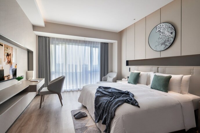 Imagen de la habitación del Hotel Somerset Daxing Beijing. Foto 13