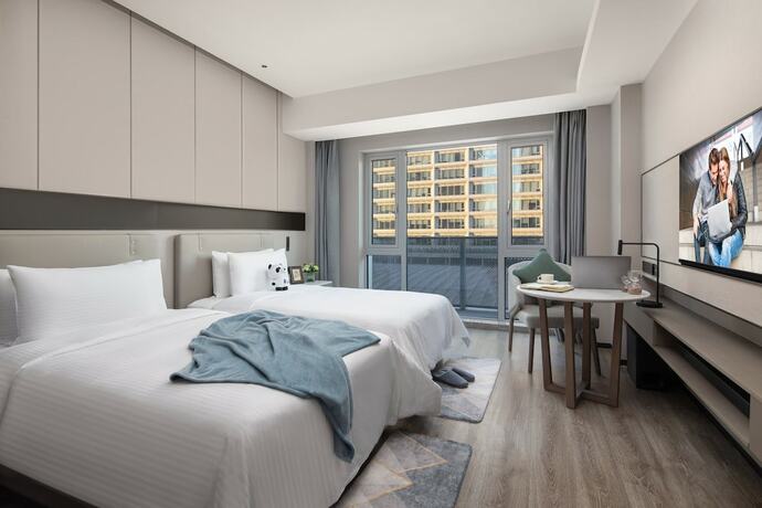 Imagen de la habitación del Hotel Somerset Daxing Beijing. Foto 14