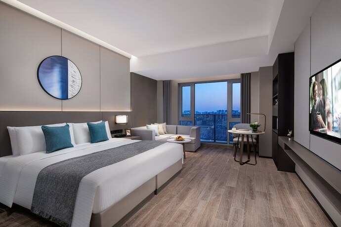 Imagen de la habitación del Hotel Somerset Daxing Beijing. Foto 16