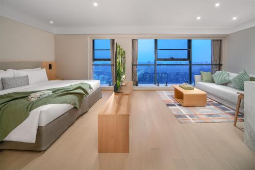 Imagen de la habitación del Hotel Somerset Fengdong Xi\'an. Foto 16