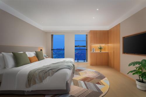 Imagen de la habitación del Hotel Somerset Fengdong Xi\'an. Foto 19