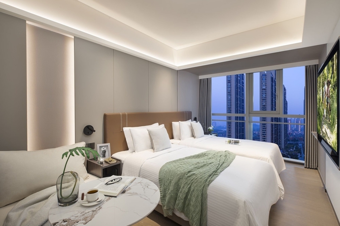 Imagen de la habitación del Hotel Somerset Future Center Wuhan. Foto 2