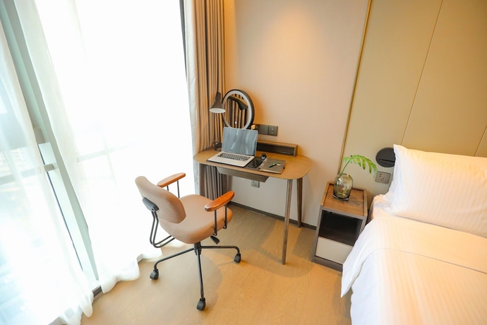 Imagen de la habitación del Hotel Somerset Future Center Wuhan. Foto 16