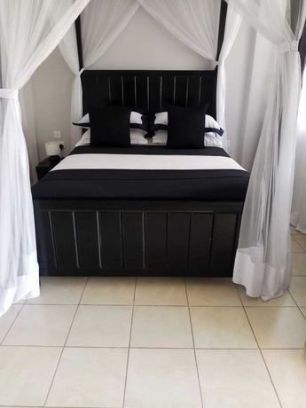 Imagen de la habitación del Hotel Somerset Gardens Resort. Foto 9