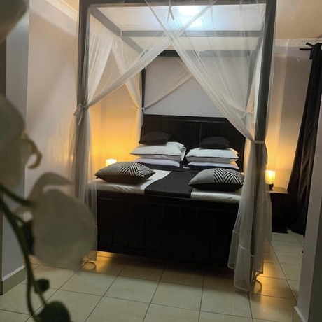 Imagen de la habitación del Hotel Somerset Gardens Resort. Foto 11