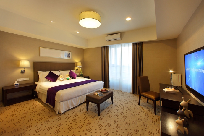 Imagen de la habitación del Hotel Somerset Heping Shenyang. Foto 4