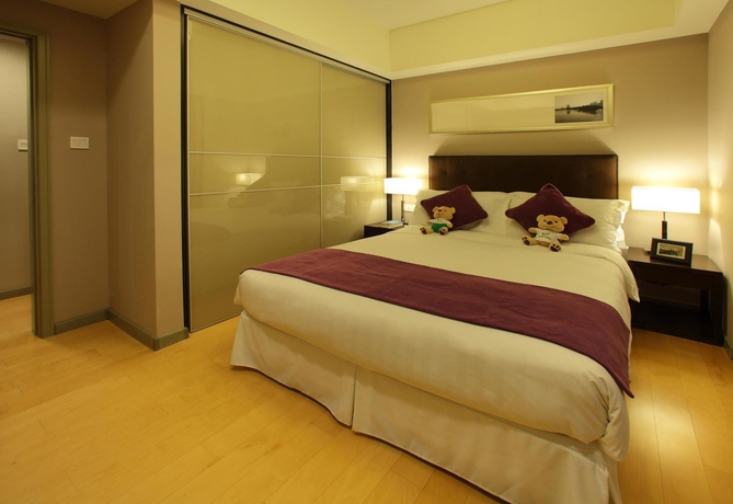 Imagen de los exteriores del Hotel Somerset Heping Shenyang. Foto 10