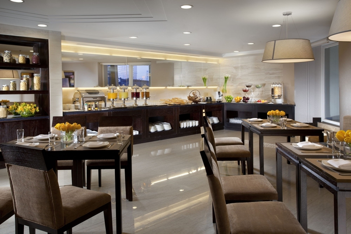 Imagen del bar/restaurante del Hotel Somerset Heping Shenyang. Foto 3